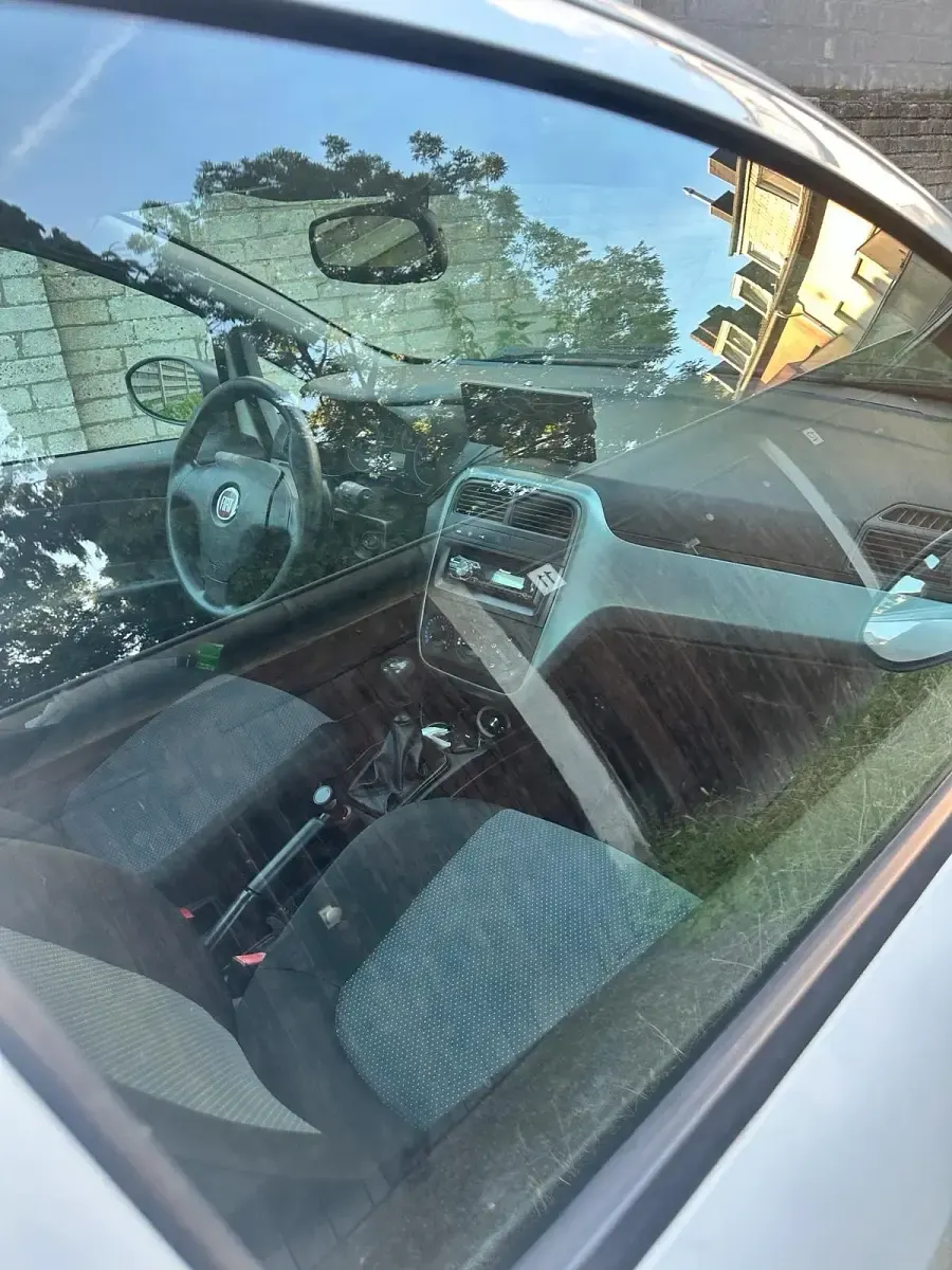 Gebraucht Fiat Punto 73 PS (53 kW) 2012 Weiß Kleinwagen