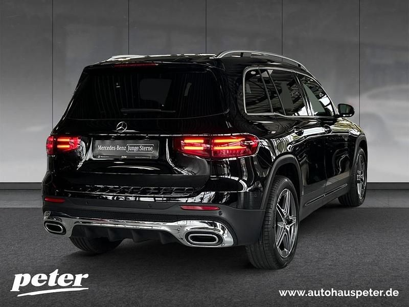 Gebraucht Mercedes GLB180 AMG 136 PS (100 kW) 2024 Metalliclack kosmosschwarz SUV