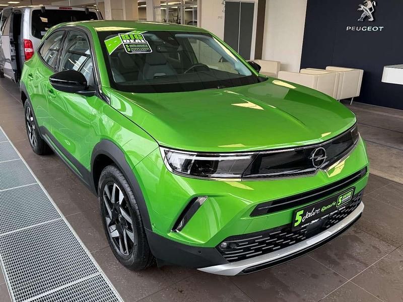 Gebraucht Opel Mokka-e Elegance 100 kW (136 PS) 2022 Matcha green/ikone gruen SUV
