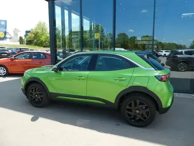 Gebraucht Opel Mokka-e Elegance 100 kW (136 PS) 2024 Grün (matcha green) SUV