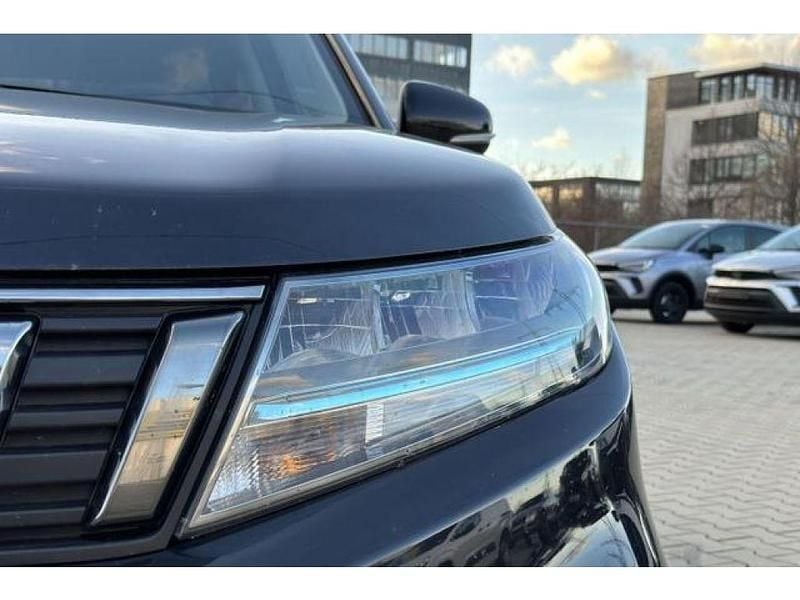 Cosmic black pearl me.../schwarz (metallic) Gebraucht 2021 Suzuki Vitara Comfort SUV | 17.449 € (Fairer Preis) - Bild 1/4