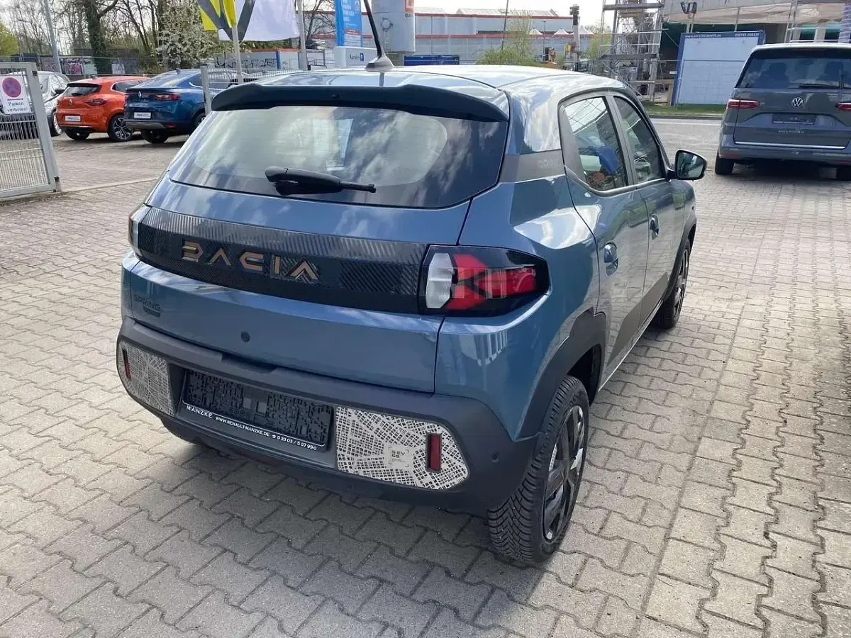 Gebraucht Dacia Spring Extreme 47 kW (65 PS) 2025 Schieferblau Kleinwagen