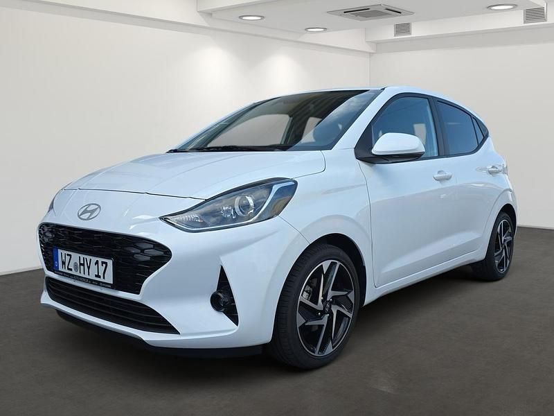 Purple (atlas white / sol) Gebraucht 2024 Hyundai i10 Prime Kleinwagen | 17.489 € (Fairer Preis) - Bild 1/4