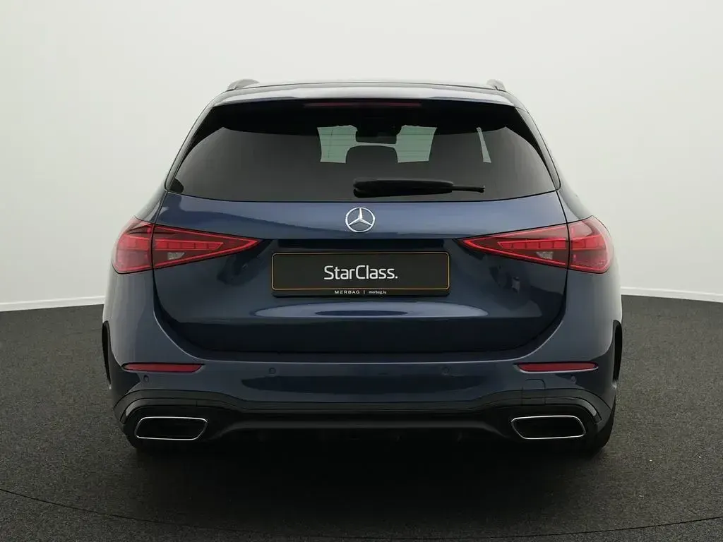 Gebraucht Mercedes C200 AMG Line Premium 163 PS (119 kW) 2025 Blau Kombi