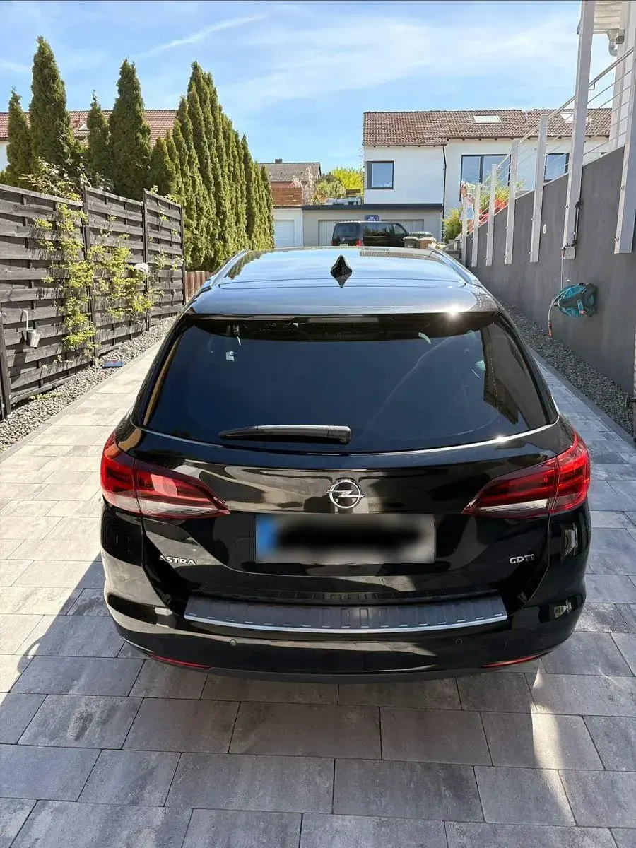 Używany Opel Astra Dynamic 110 KM (80 kW) 2017 Czarny Kombi