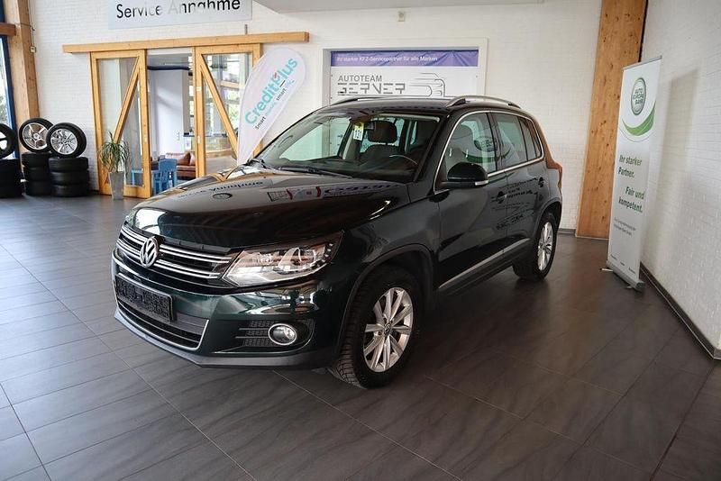 Veneziengrünperleffekt (metallic) Gebraucht 2012 VW Tiguan SUV | 6.499 € (Superpreis) - Bild 1/3