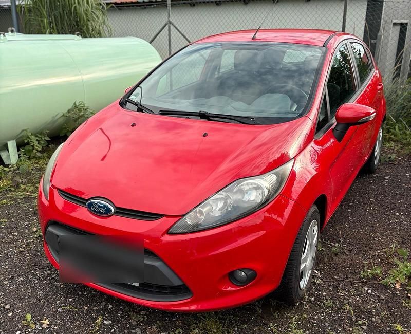 Rot Gebraucht 2010 Ford Fiesta Kleinwagen | 3.800 € - Bild 1/4