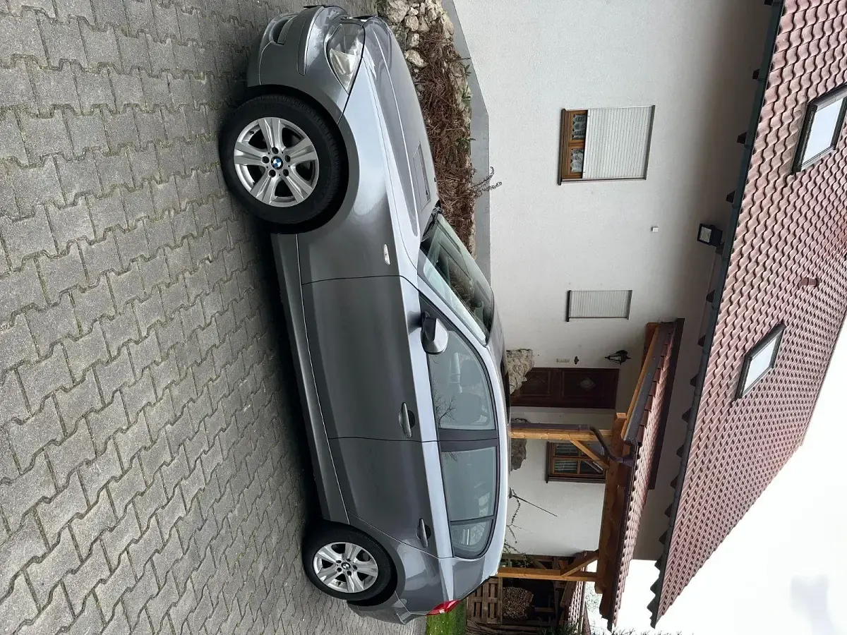 Używany BMW 116 122 KM (89 kW) 2010 Szary Hatchback