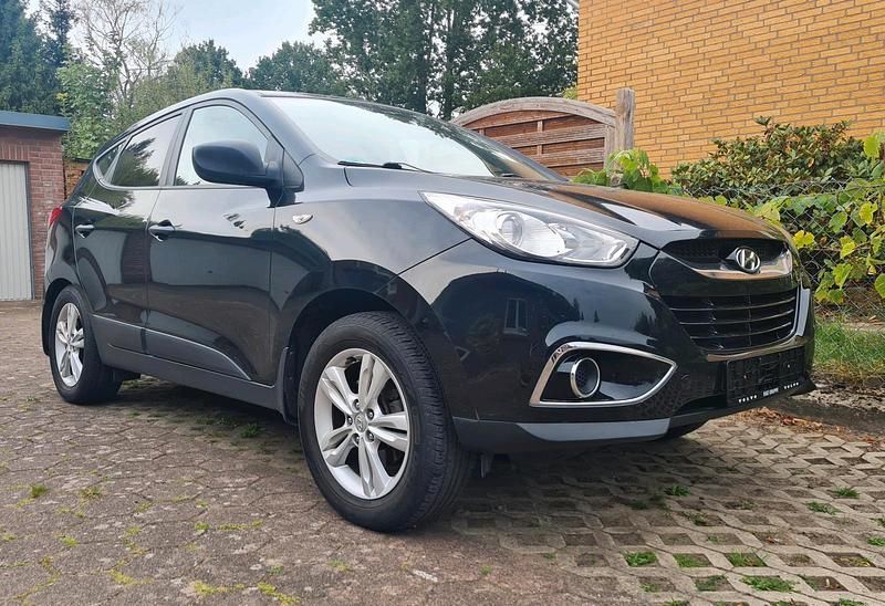 Schwarz Gebraucht 2011 Hyundai Tucson SUV | 8.100 € - Bild 1/4