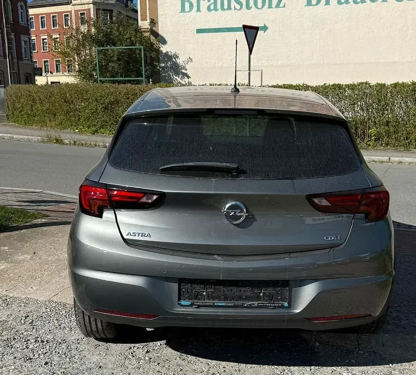 Używany Opel Astra Dynamic 110 KM (80 kW) 2018 Szary Sedan/Limuzyna