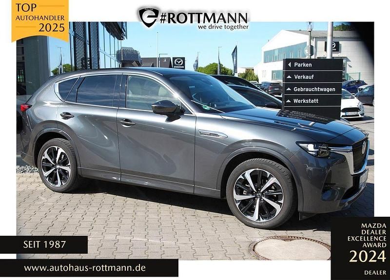 Grau Gebraucht 2023 Mazda CX-60 Takumi-Line SUV | 48.900 € (Etwas zu teuer) - Bild 1/4