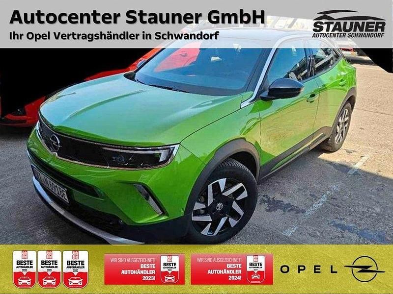 Grün Gebraucht 2023 Opel Mokka-e Elegance SUV | 17.480 € (Superpreis) - Bild 1/4