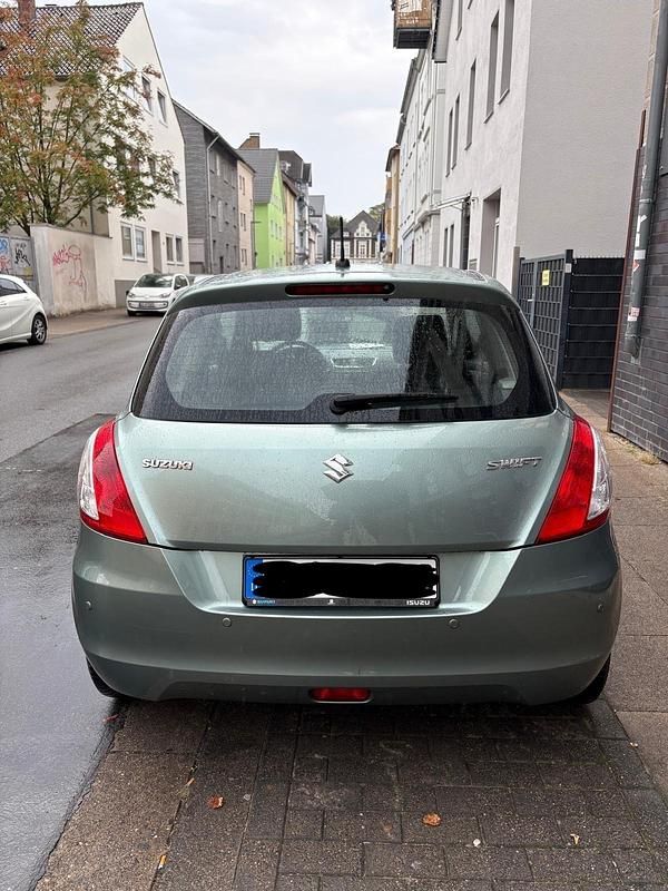 Gebraucht Suzuki Swift 94 PS (69 kW) 2011 Grün Kleinwagen