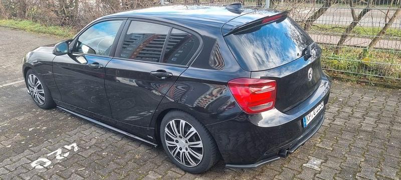 Gebraucht BMW 118 Sport Line 170 PS (125 kW) 2012 Schwarz Kleinwagen