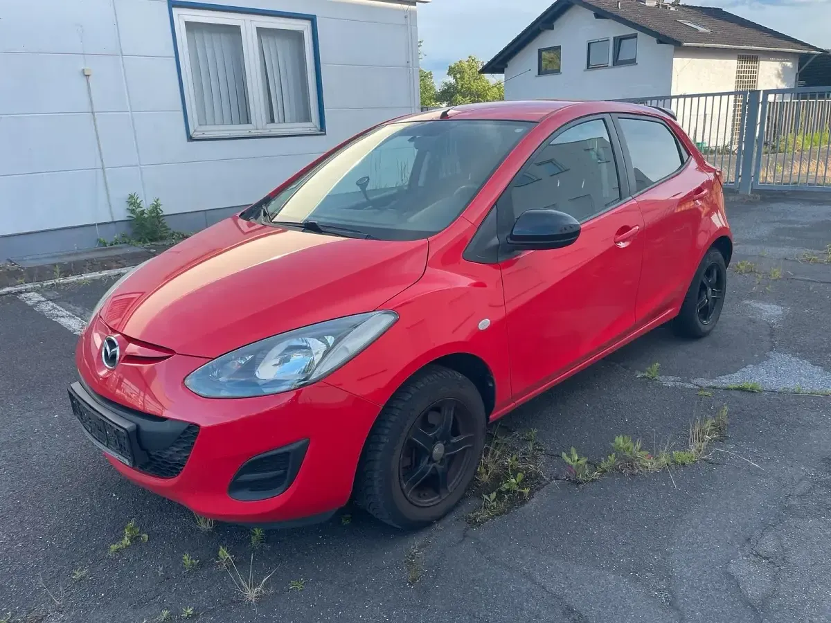 Gebraucht Mazda 2 75 PS (55 kW) 2014 Rot Kleinwagen