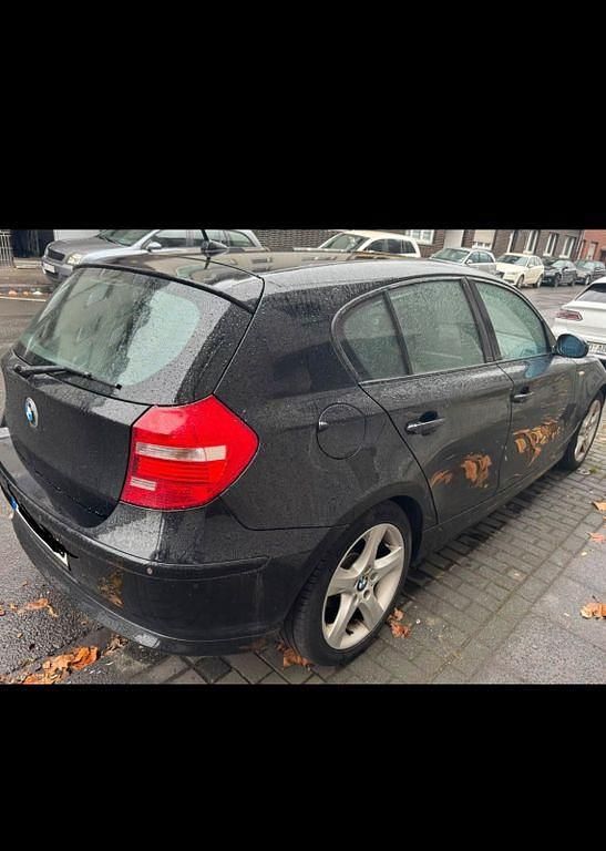Gebraucht BMW 116 122 PS (89 kW) 2007 Schwarz Kleinwagen