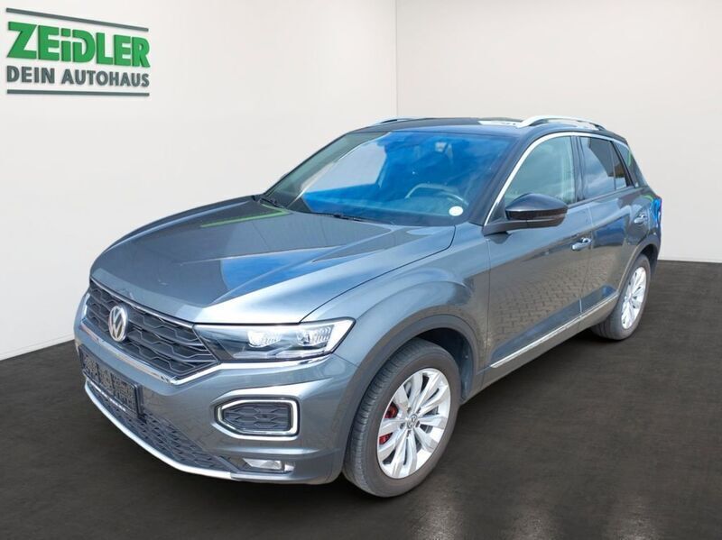 Indiumgrau Gebraucht 2019 VW T-Roc Sportline SUV | 23.580 € (Fairer Preis) - Bild 1/4