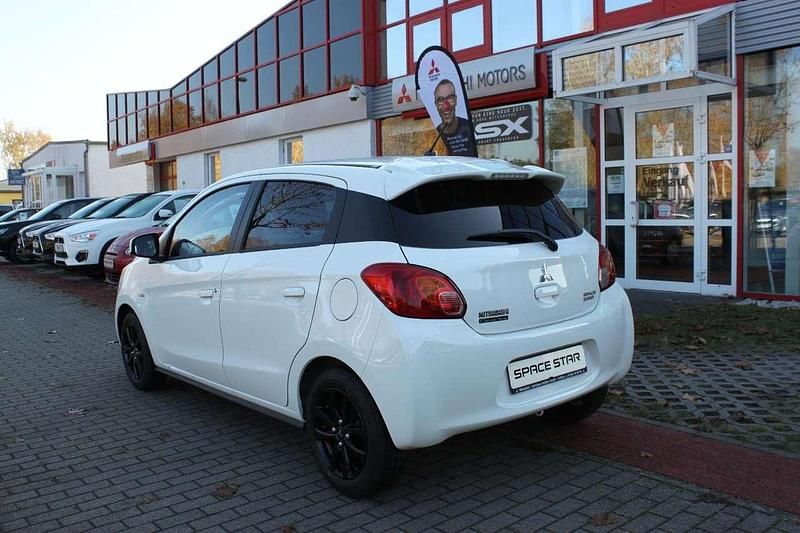 Gebraucht Mitsubishi Space Star Diamant Edition 80 PS (58 kW) 2015 Islandweiß Limousine