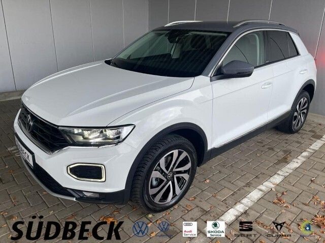 Weißgrau (metallic) Gebraucht 2021 VW T-Roc Active SUV | 27.590 € (Fairer Preis) - Bild 1/4