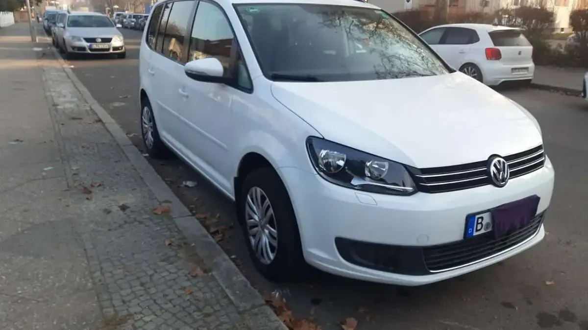Gebraucht VW Touran Comfortline 150 PS (110 kW) 2014 Weiß Van / Kleinbus
