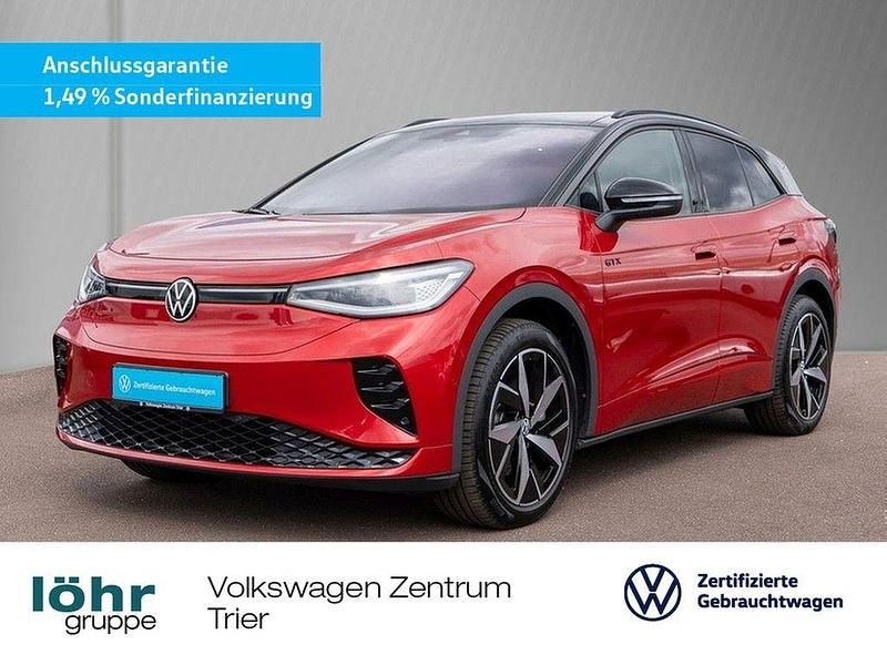 Kings red metallic Gebraucht 2024 VW ID.4 GTX SUV | 44.380 € (Etwas zu teuer) - Bild 1/4