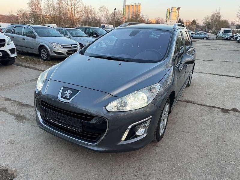 Grau Gebraucht 2011 Peugeot 308 SW Active Kombi | 1.999 € - Bild 1/4