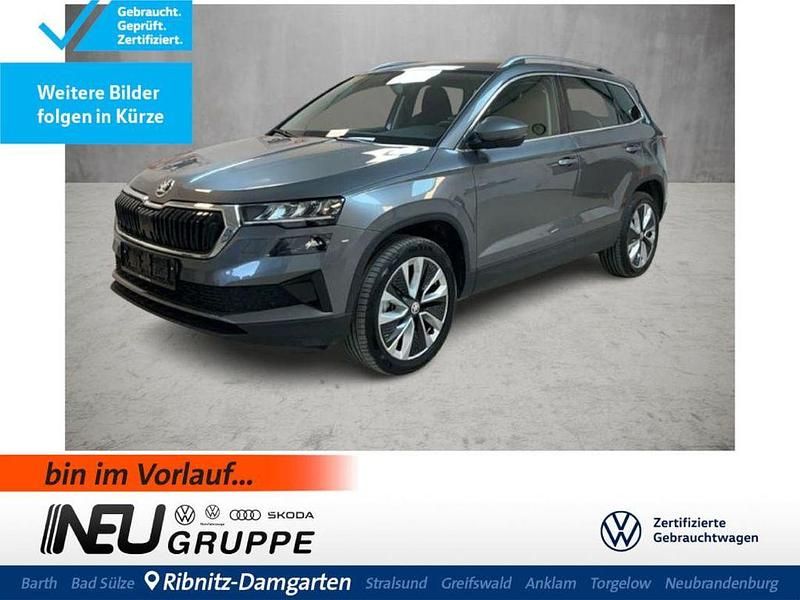 Graphitegrau (metallic) Gebraucht 2024 Skoda Karoq Selection SUV | 26.979 € (Superpreis) - Bild 1/4