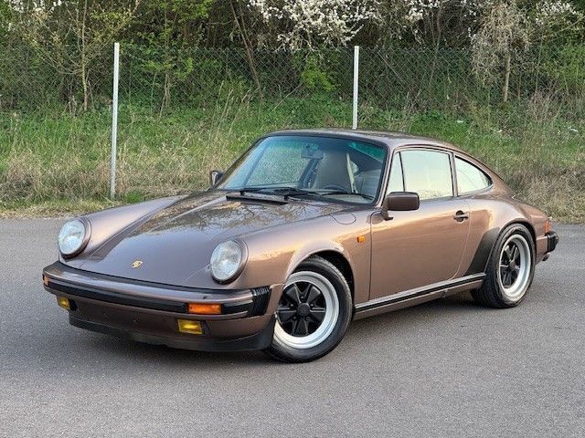 Braun Gebraucht 1986 Porsche 911 Carrera Coupé | 64.999 € - Bild 1/4