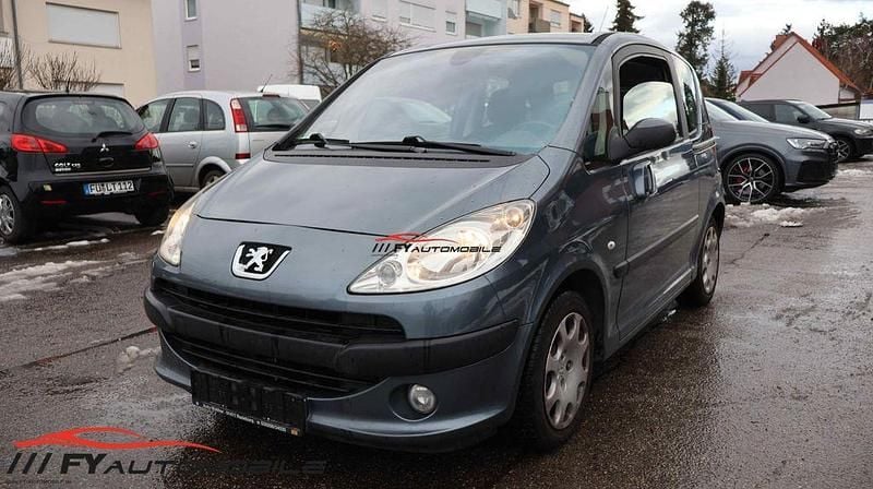 Grau Gebraucht 2007 Peugeot 1007 Premium Van / Kleinbus | 1.990 € (Guter Preis) - Bild 1/4
