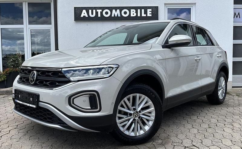 Ascotgrau Gebraucht 2024 VW T-Roc Life SUV | 26.479 € (Guter Preis) - Bild 1/4