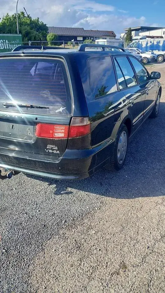 Gebraucht Mitsubishi Galant 163 PS (119 kW) 1998 Grün Kombi