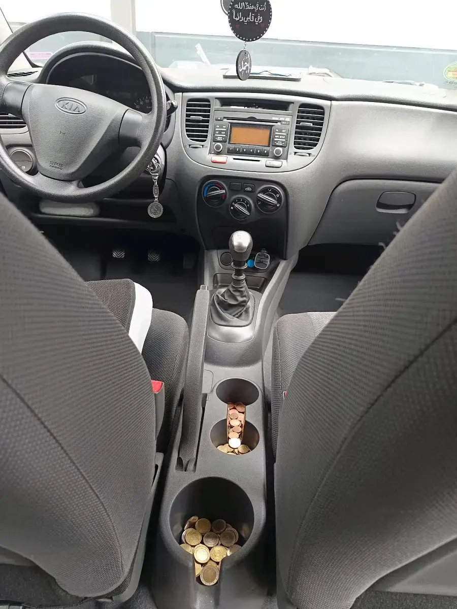 Gebraucht Kia Rio 96 PS (70 kW) 2009 Orange Limousine