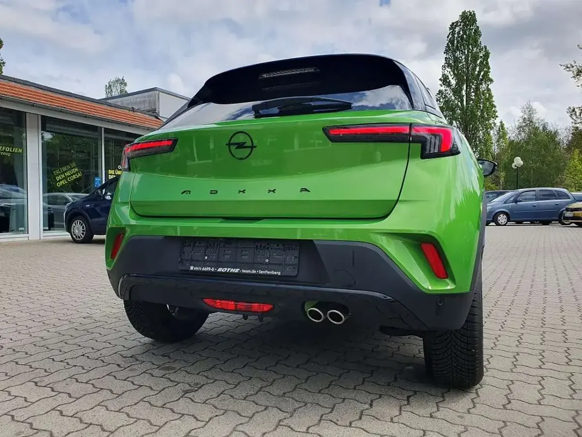 Gebraucht Opel Mokka 131 PS (96 kW) 2024 Ikone grün metallic SUV