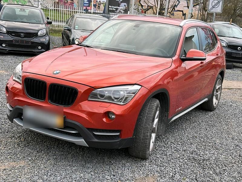 Second-hand BMW X1 177 CP (130 kW) 2012 Portocaliu SUV