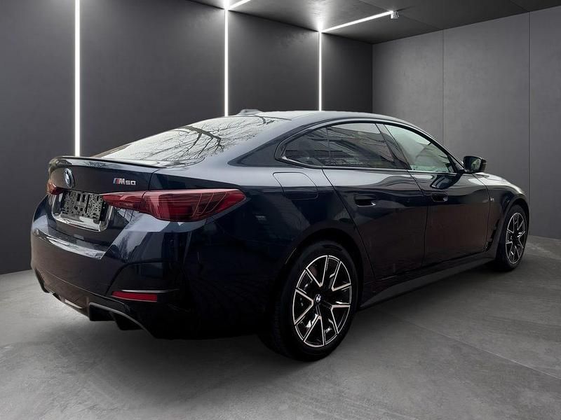 Gebraucht BMW i4 Performance 400 kW (544 PS) 2024 Tansanitblau ii metallic Limousine