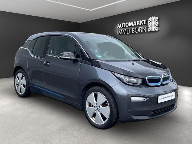 Mineralgrau met.bmw i (metallic) Gebraucht 2018 BMW i3 Comfort Edition Kleinwagen | 15.880 € (Fairer Preis) - Bild 1/4