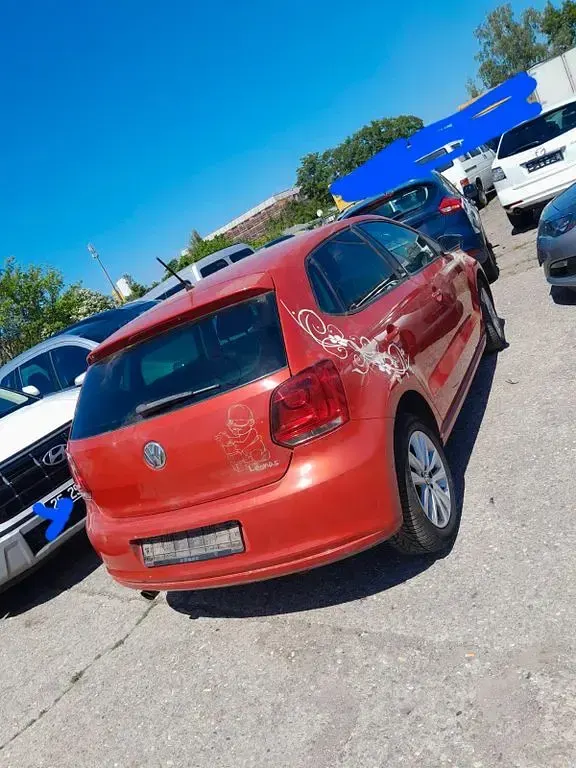 Käytetty VW Polo Style 90 HP (66 kW) 2011 Oranssi Viistoperä