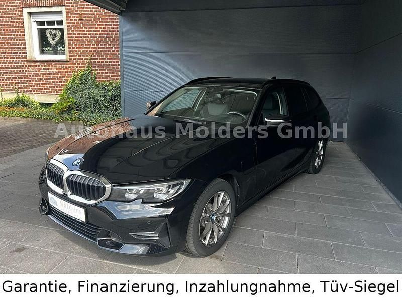 Schwarz Gebraucht 2022 BMW 330e Sport Line Kombi | 30.950 € (Fairer Preis) - Bild 1/4