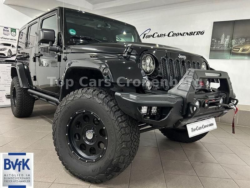 Schwarz Gebraucht 2014 Jeep Wrangler Unlimited Sahara SUV | 42.950 € - Bild 1/4