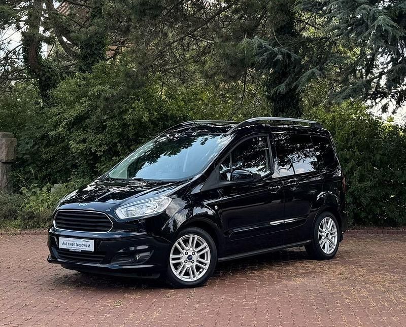 Schwarz Gebraucht 2015 Ford Tourneo Courier Titanium Van / Kleinbus | 7.999 € (Fairer Preis) - Bild 1/4