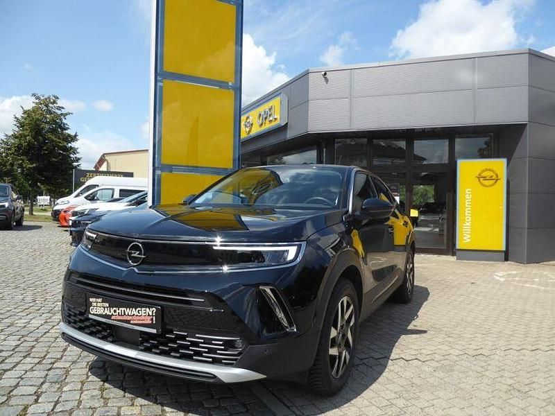 Gebraucht Opel Mokka-e Elegance 100 kW (136 PS) 2023 Karbon schwarz metallic SUV