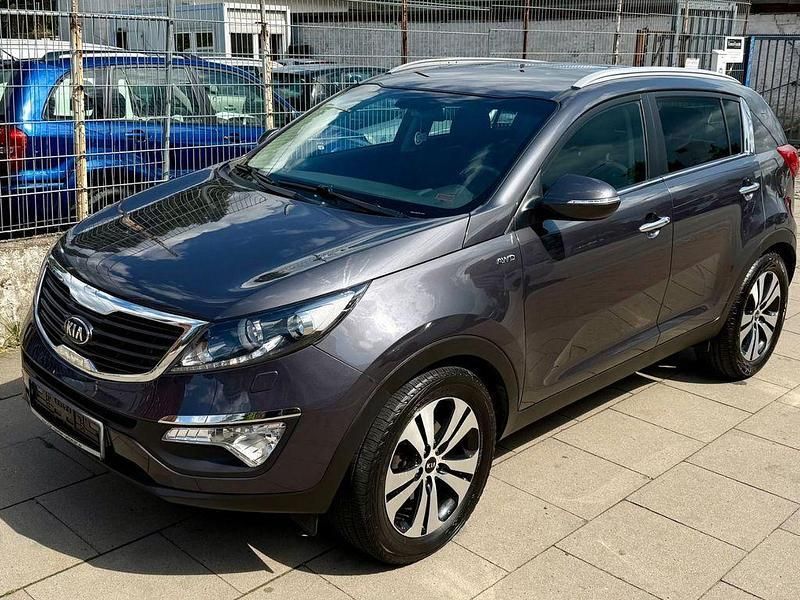 (e5b) winchestergrau met. Gebraucht 2013 Kia Sportage FIFA World Cup Edition SUV | 10.950 € (Guter Preis) - Bild 1/4