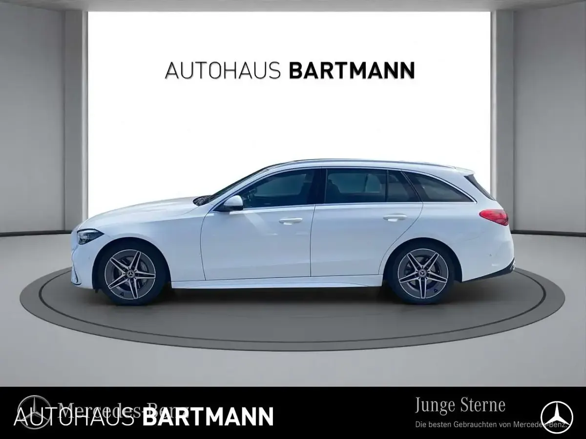 Gebraucht Mercedes C200 AMG 204 PS (150 kW) 2022 Polarweiß Kombi