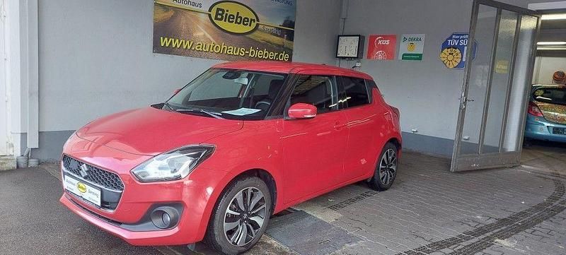 Rot Gebraucht 2019 Suzuki Swift Comfort+ Limousine | 10.650 € - Bild 1/4