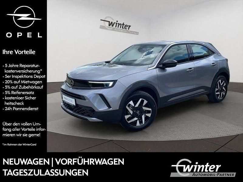Grau Gebraucht 2024 Opel Mokka-e Elegance SUV | 29.990 € - Bild 1/4