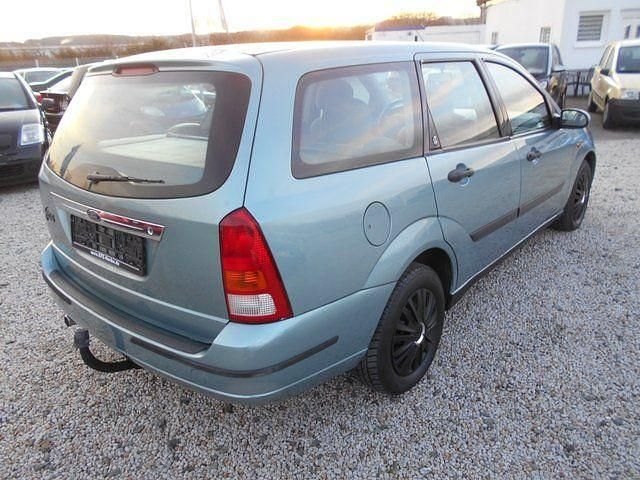Gebraucht Ford Focus Ghia 116 PS (85 kW) 1999 Grün metallic Kombi