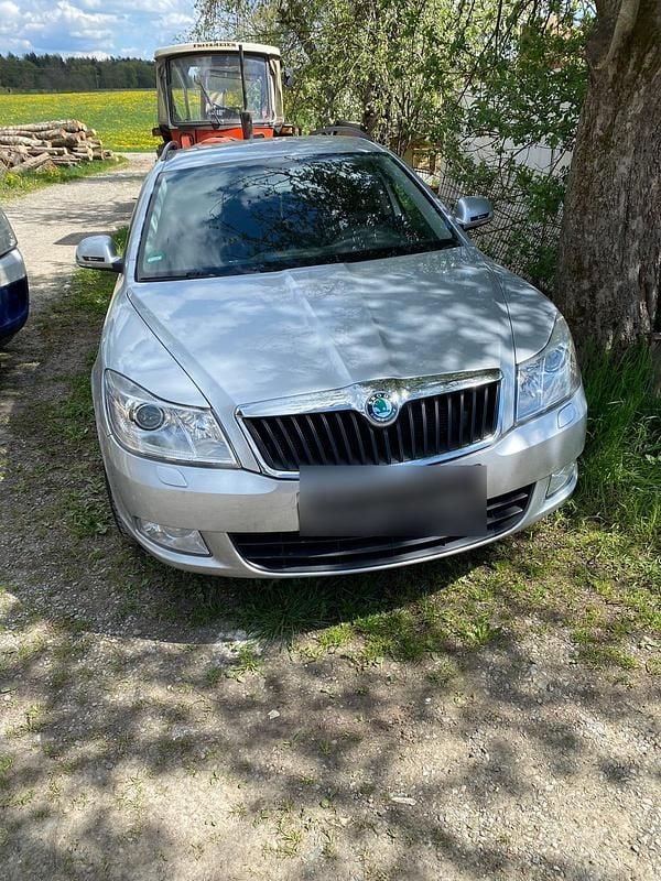 Second-hand Skoda Octavia 105 CP (77 kW) 2012 Argintiu Break