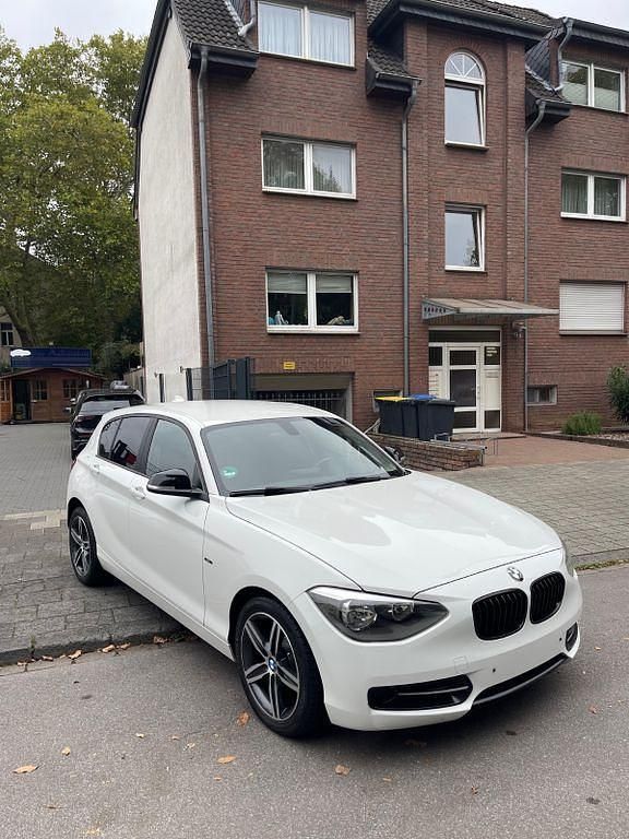 Weiß Gebraucht 2012 BMW 116 Performance Kleinwagen | 7.980 € (Fairer Preis) - Bild 1/4