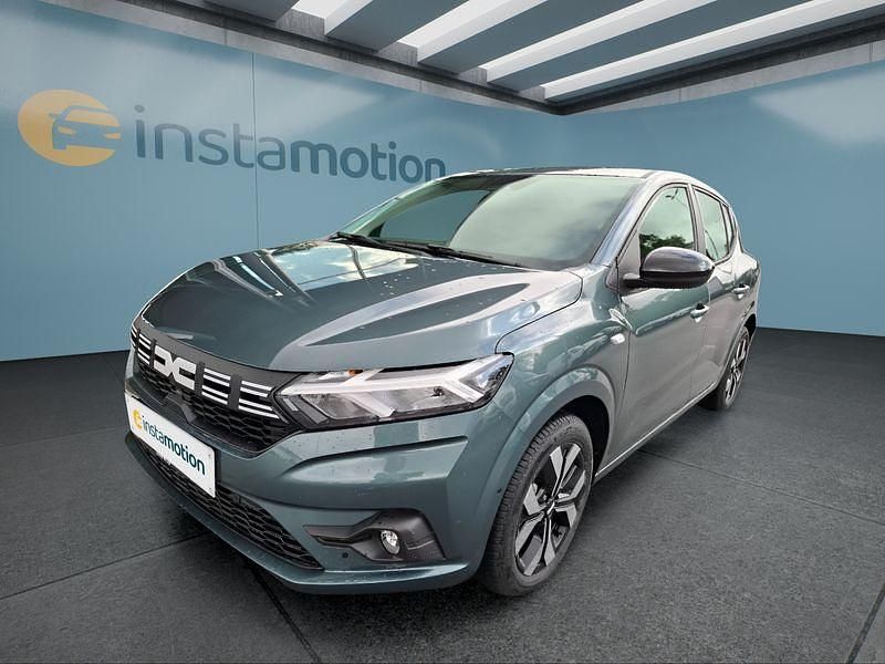 Grün Gebraucht 2025 Dacia Sandero Kleinwagen | 21.699 € (Etwas zu teuer) - Bild 1/4
