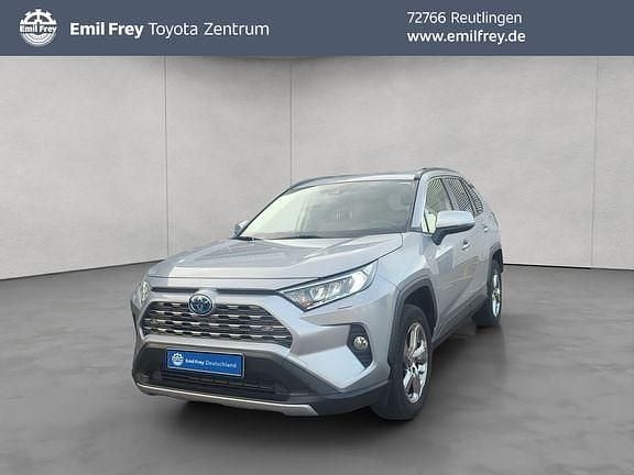 Lichtsilber metallic Gebraucht 2020 Toyota RAV4 Hybrid Plus SUV | 31.990 € (Guter Preis) - Bild 1/4
